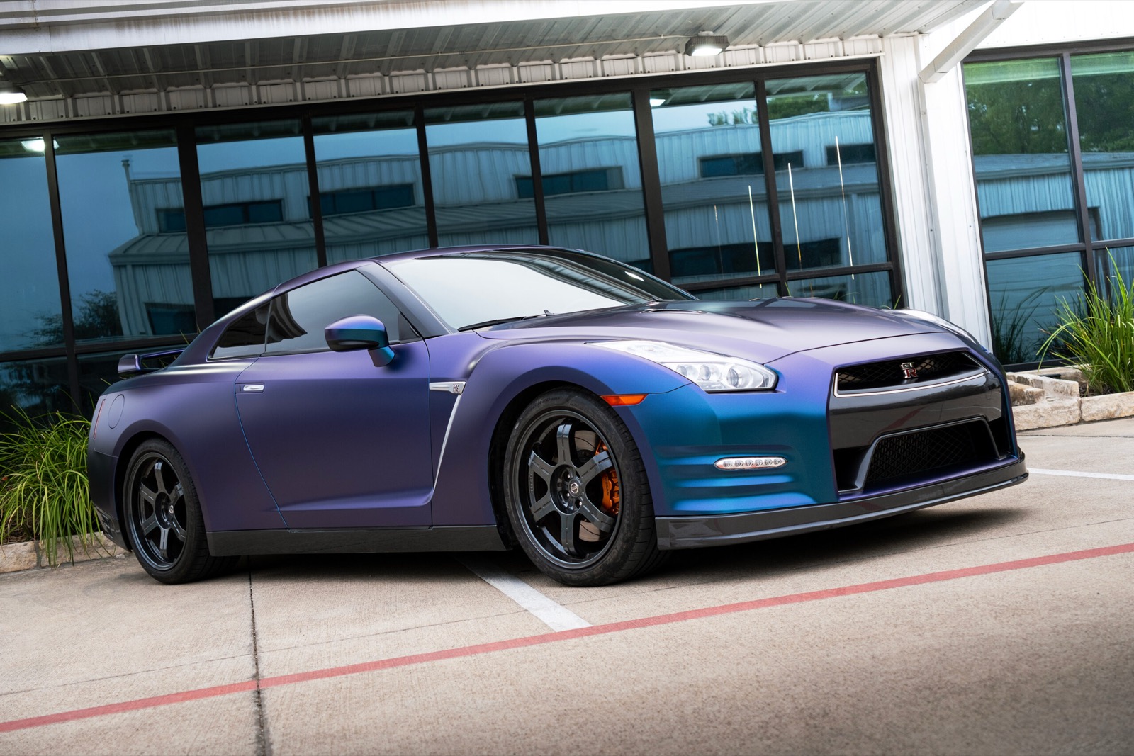 STEK DYNOprism colour-shift PPF on a Nissan GT-R — official STEK image